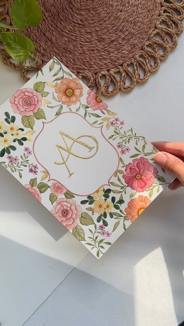 32 Anniversary Card Ideas to Make at Home (Photos Inside) 18 Floral card with a gold monogram centered within a decorative border of roses.