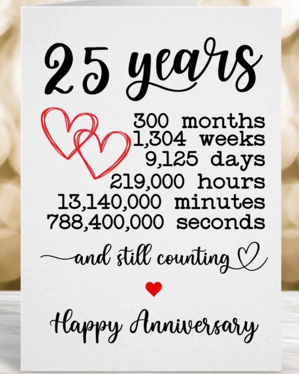 32 Anniversary Card Ideas to Make at Home (Photos Inside) 22 White anniversary card celebrating 25 years with red hearts and time calculations.