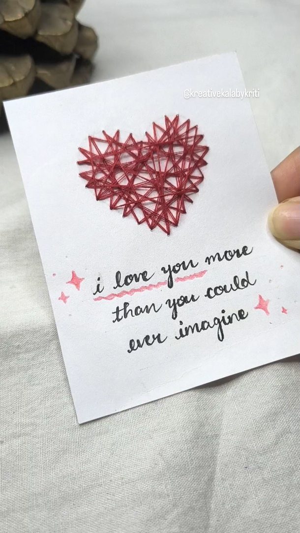 32 Anniversary Card Ideas to Make at Home (Photos Inside) 13 White greeting card with a red string art heart and handwritten love message.