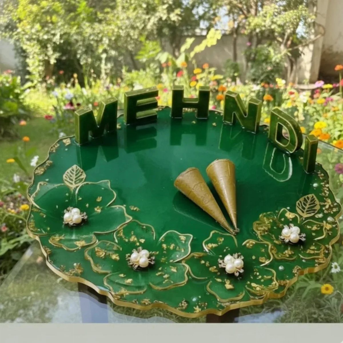 Green resin mehndi platter with gold floral details, pearl accents, and 3D lettering.