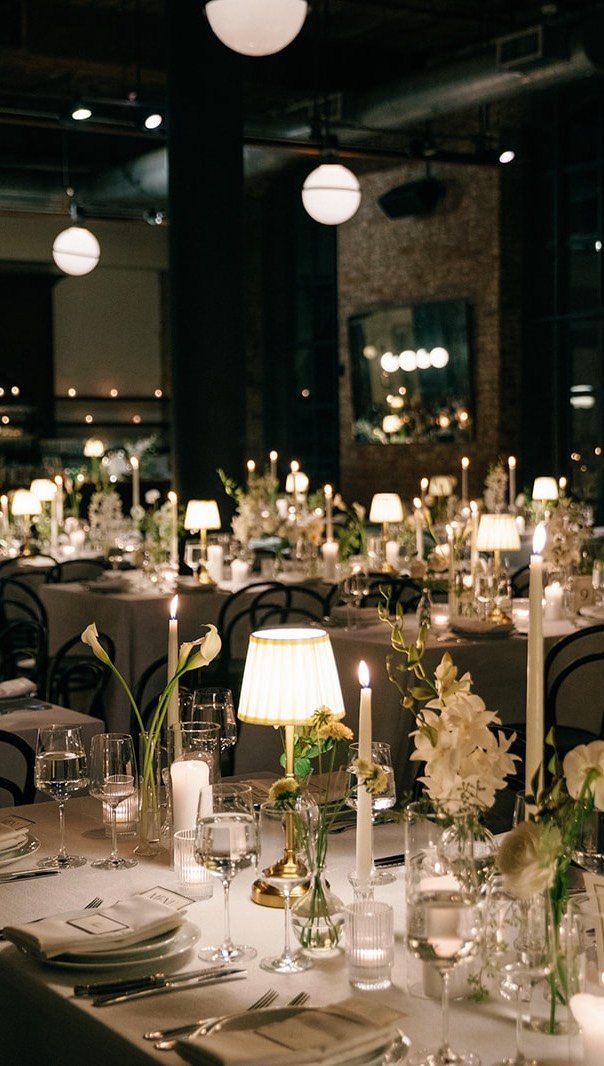 Wedding Mood Board Ideas: 39 Styles from Celestial to Coastal 34 Formal dining tables with white linens, candles, small lamps, and white floral arrangements.