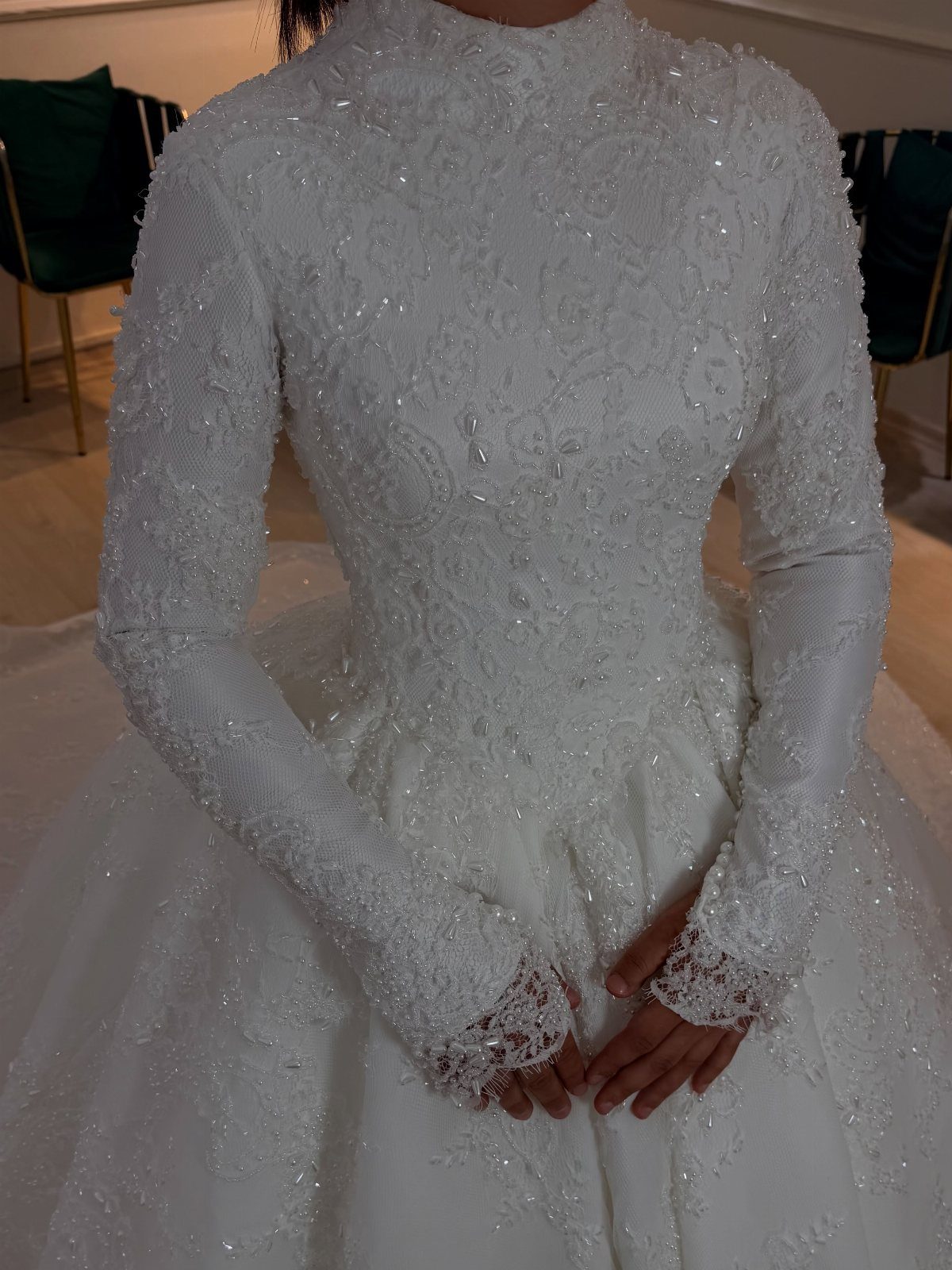 Wedding Mood Board Ideas: 39 Styles from Celestial to Coastal 12 White long-sleeved wedding dress with high neck and intricate lace embroidery and beadwork.