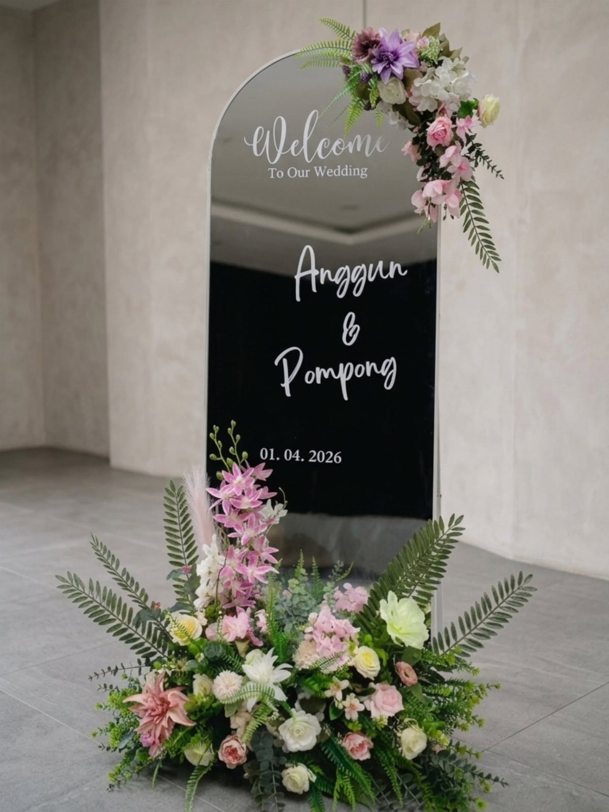 Wedding Mood Board Ideas: 39 Styles from Celestial to Coastal 25 Arched black wedding welcome mirror with pink and white floral arrangements.