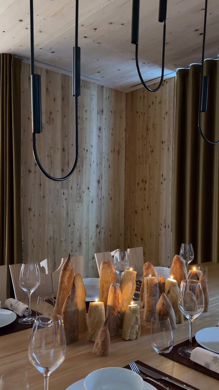 Wedding Mood Board Ideas: 39 Styles from Celestial to Coastal 15 Sourdough bread pieces and small candles as a centerpiece on a wooden dining table.