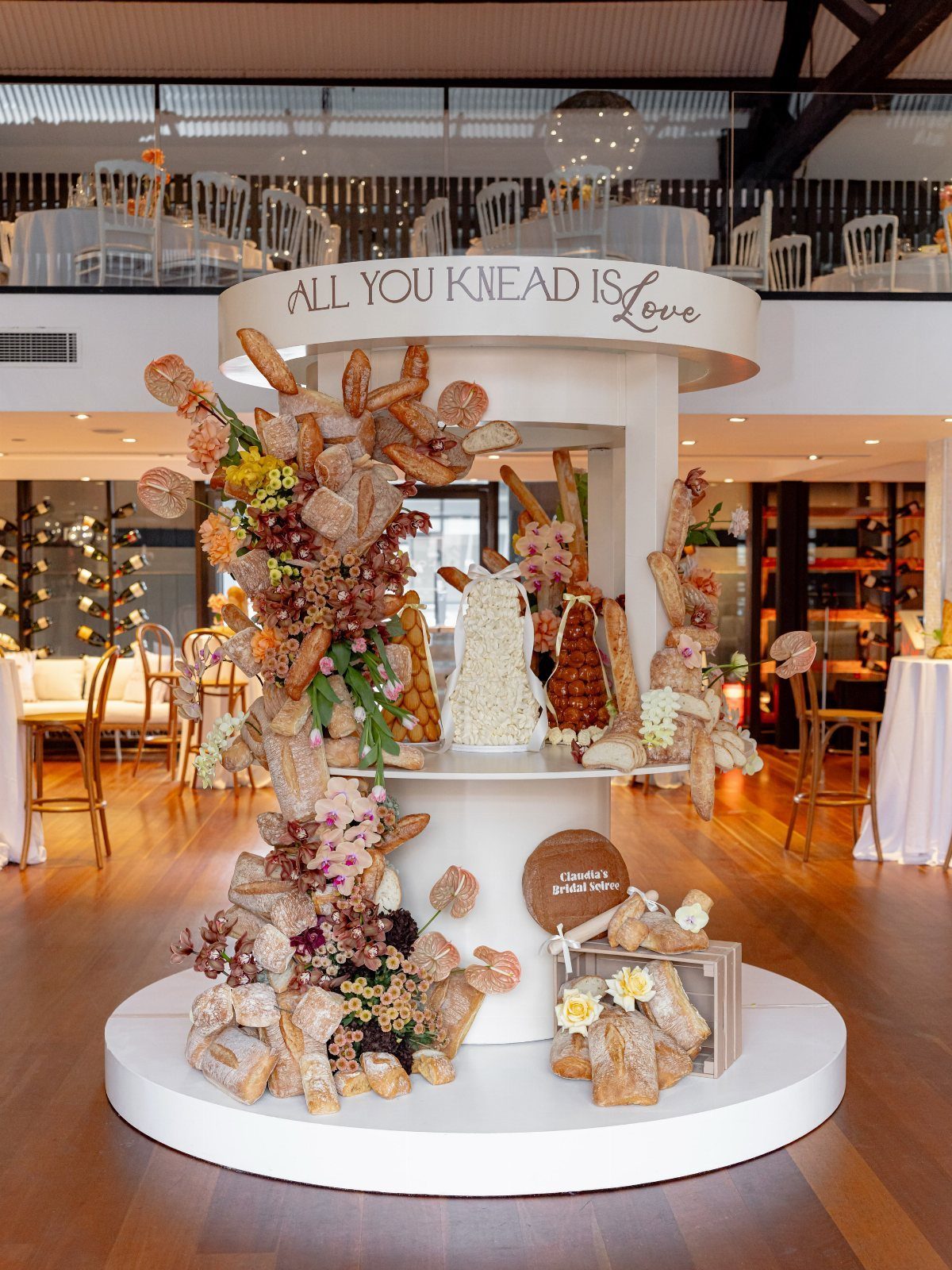 Wedding Mood Board Ideas: 39 Styles from Celestial to Coastal 22 Artistic bread and floral display with a sign reading All You Knead Is Love